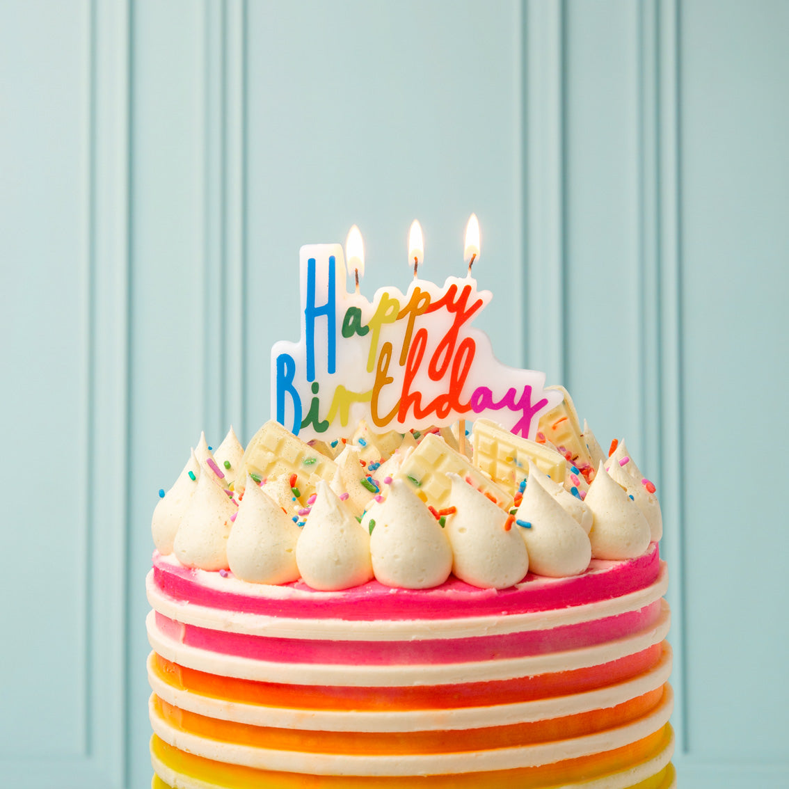 Rainbow Brights Large 'Happy Birthday' Candle